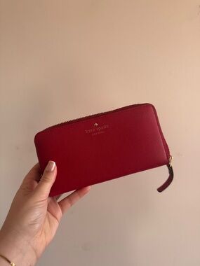 kate spade red zip-around saffiano wallet